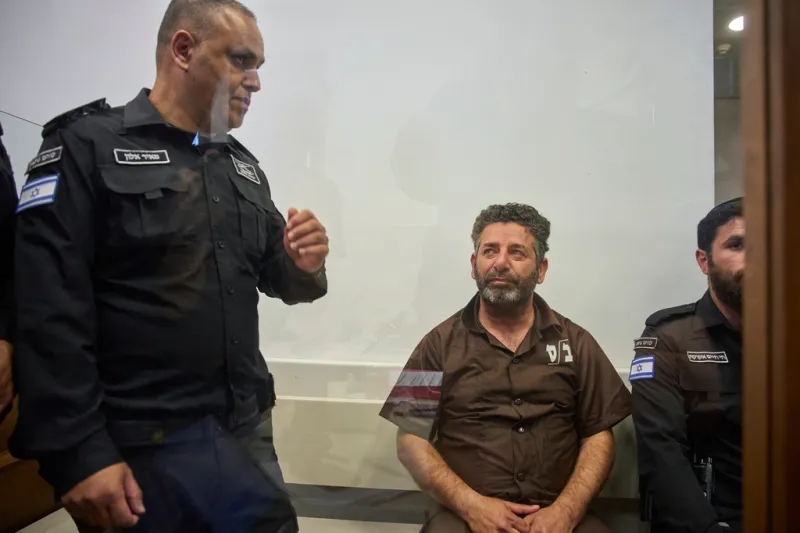 Palestinian-Spanish activist Saif Abukeshek, center, a member of the Global Sumud Flotilla